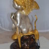 Cupid Girl On A Rock Bronze Statue  -  Size: 20"L x 15"W x 25"H.