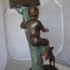 Boy Sitting on a Tree with Mailbox Bronze Statue -  Size: 22"L x 23"W x 49"H.