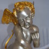 Cupid Girl On A Rock Bronze Statue  -  Size: 20"L x 15"W x 25"H.