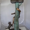 Boy Sitting on a Tree with Mailbox Bronze Statue -  Size: 22"L x 23"W x 49"H.