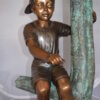 Boy Sitting on a Tree with Mailbox Bronze Statue -  Size: 22"L x 23"W x 49"H.