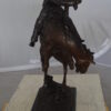 Rattlesnake by Remington Bronze Statue -  Size: 16"L x 13"W x 22"H.