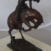 Rattlesnake by Remington Bronze Statue -  Size: 16"L x 13"W x 22"H.