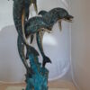 Three Dolphin Fountain  Bronze Statue -  Size: 21"L x 26"W x 45"H.