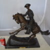 Remington Cowboy on marble Bronze Statue -  Size: 24"L x 9"W x 23"H.