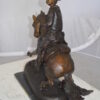 Remington Cowboy on marble Bronze Statue -  Size: 24"L x 9"W x 23"H.