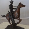 Trooper of the Plains Bronze Statue by Remington -  Size: 9"L x 22"W x 22"H.