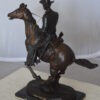 Trooper of the Plains Bronze Statue by Remington -  Size: 9"L x 22"W x 22"H.