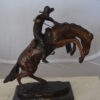 Bronco Buster Bronze Statue by Remington -  Size: 9"L x 24"W x 21"H.