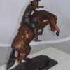 Bronco Buster Bronze Statue by Remington -  Size: 9"L x 24"W x 21"H.