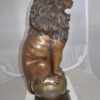 Pair of lions standing on balls, bronze statues -  Size: 14"L x 16"W x 38"H.