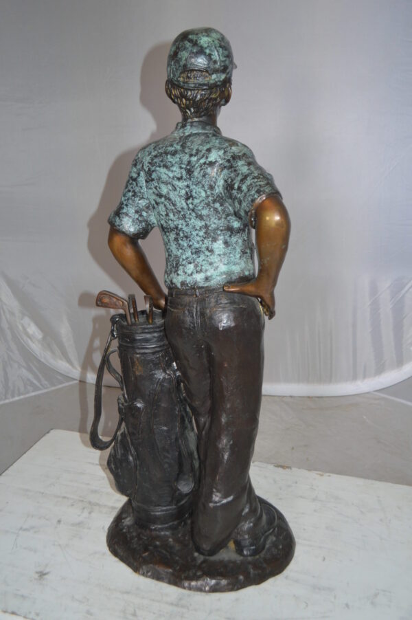 Golfer with bag Bronze Statue -  Size: 12"L x 13"W x 32"H.