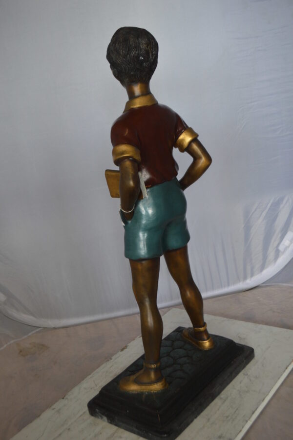 Kid Holding a Book Bronze Statue -  Size: 18"L x 11"W x 36"H.