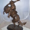 Jumbo Bronco Buster  by Remington Bronze Statue -  Size: 19"L x 11"W x 36"H.