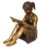 Girl Sitting and Reading a Book Bronze Statue -  Size: 23"L x 15"W x 24"H.