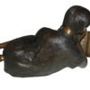 Girl laying reading a book Bronze Statue -  Size: 36"L x 17"W x 18"H.