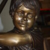 Golfer Boy Bronze - Big shoes -  Size: 18"L x 14"W x 49"H.