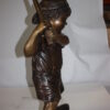 Golfer Boy Bronze - Big shoes -  Size: 18"L x 14"W x 49"H.