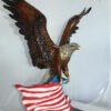 Eagle with American Flag Bronze Statue -  Size: 32"L x 14"W x 35"H.