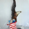 Eagle with American Flag Bronze Statue -  Size: 32"L x 14"W x 35"H.