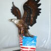 Eagle with American Flag Bronze Statue -  Size: 32"L x 14"W x 35"H.