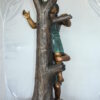 Two Kids Climbing on a Tree Bronze Statue -  Size: 17"L x 17"W x 46"H.