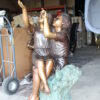 Two Kids Playing with Butterflies Bronze Statue -  Size: 30"L x 30"W x 50"H.