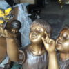 Two Kids Playing with Butterflies Bronze Statue -  Size: 30"L x 30"W x 50"H.