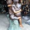 Two Kids Playing with Butterflies Bronze Statue -  Size: 30"L x 30"W x 50"H.