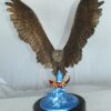 Eagle Catching his Prey Bronze Statue -  Size: 17"L x 20"W x 25"H.