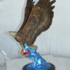 Eagle Catching his Prey Bronze Statue -  Size: 17"L x 20"W x 25"H.