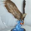 Eagle Catching his Prey Bronze Statue -  Size: 17"L x 20"W x 25"H.