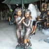 Two Kids Holding an Umbrella - Bronze Statue - Fountain -  90"L x 34"W x 90"H.