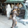 Two Kids Holding an Umbrella - Bronze Statue - Fountain -  90"L x 34"W x 90"H.