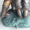 Two Kids Holding an Umbrella - Bronze Statue - Fountain -  90"L x 34"W x 90"H.