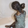 Girl listening to a Shell fountain-Bronze Statue -  Size: 17"L x 10"W x 20"H.