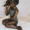 Girl listening to a Shell fountain-Bronze Statue -  Size: 17"L x 10"W x 20"H.