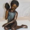 Girl listening to a Shell fountain-Bronze Statue -  Size: 17"L x 10"W x 20"H.