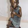 Girl in the sun -Sunny day Bronze Statue -  Size: 10"L x 11"W x 21"H.