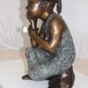 Girl in the sun -Sunny day Bronze Statue -  Size: 10"L x 11"W x 21"H.