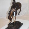 Outlaw Remington Bronze Statue -  Size: 19"L x 10"W x 26"H.