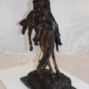 Outlaw Remington Bronze Statue -  Size: 19"L x 10"W x 26"H.