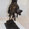 Outlaw Remington Bronze Statue -  Size: 19"L x 10"W x 26"H.