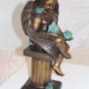 Angel sitting on Column Bronze Statue -  Size: 10"L x 9"W x 22"H.