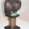 Angel sitting on Column Bronze Statue -  Size: 10"L x 9"W x 22"H.