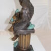 Angel sitting on Column Bronze Statue -  Size: 10"L x 9"W x 22"H.