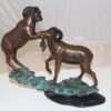 Two Rams on a rock Bronze Statue -  Size: 15"L x 8"W x 16"H.