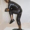 Boy plays baseball Bronze Statue -  Size: 22"L x 12"W x 36"H.