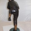 Boy plays baseball Bronze Statue -  Size: 22"L x 12"W x 36"H.