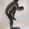 Boy plays baseball Bronze Statue -  Size: 22"L x 12"W x 36"H.